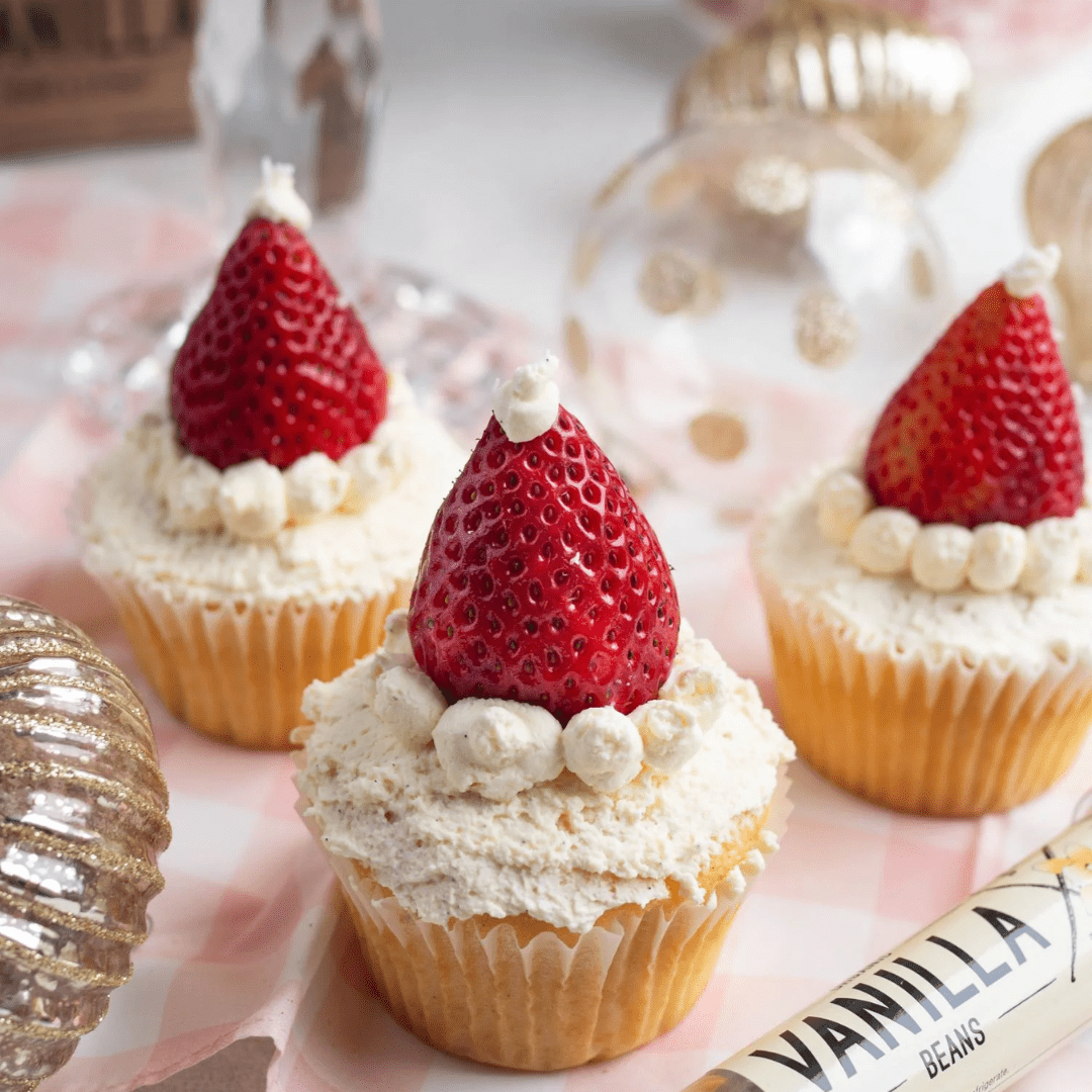 Whip Up Holiday Magic with Strawberries and Cream Santa Hat Cupcakes - Prestige Coffee