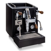 Black Izzo Vivi Dual Boiler PID home coffee machine with Italian Walnut accents on white background.