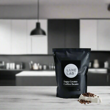 Bag of Luxe Lab Supa Crema Coffee Beans on a kitchen counter